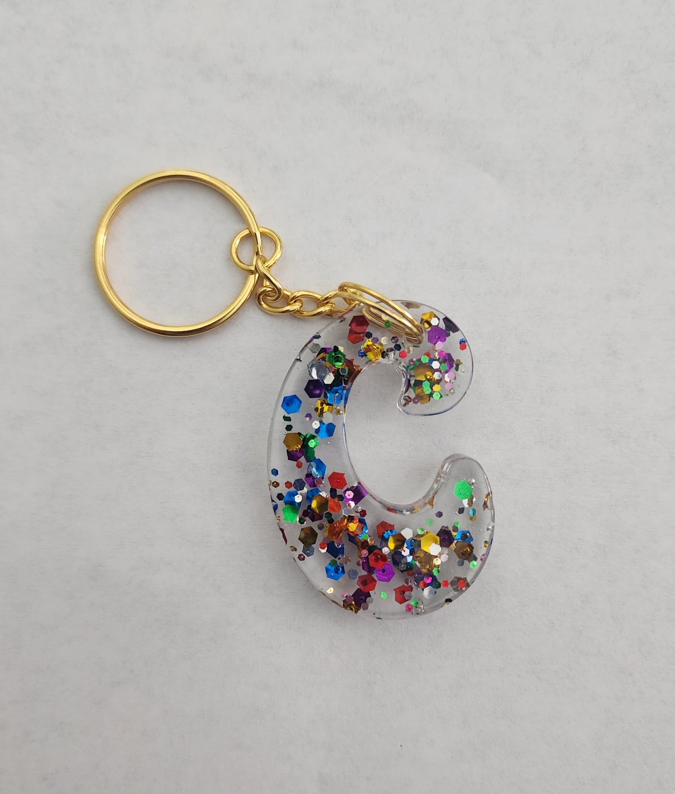 C 'Groovy' Keychain-Clear with Rainbow Glitter