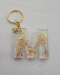 M Keychain-Clear with Orange Glitter