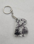 B 'Groovy' Keychain- Clear with Black Glitter