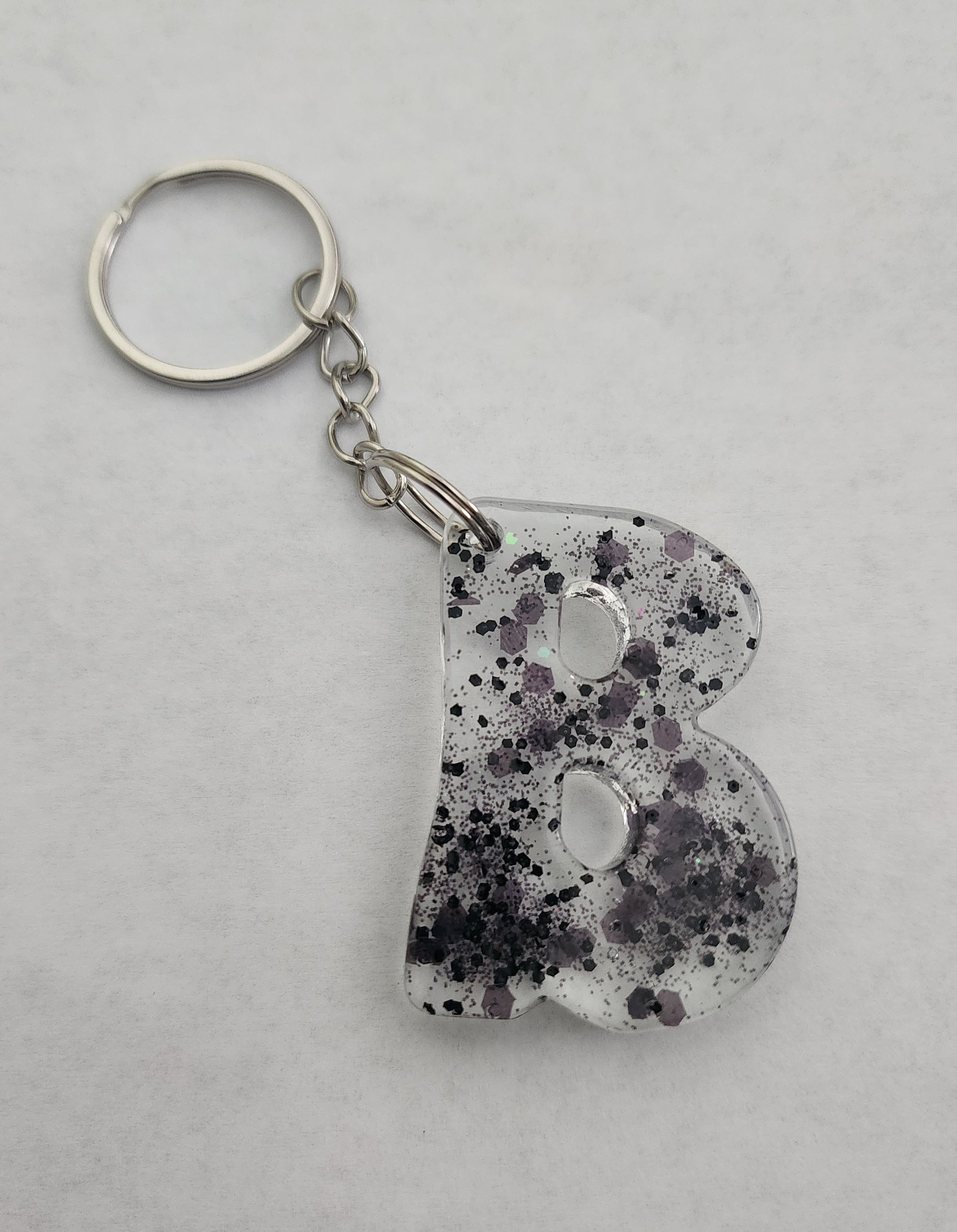 B 'Groovy' Keychain- Clear with Black Glitter