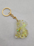 B 'Groovy' Keychain-Clear with Yellow Glitter
