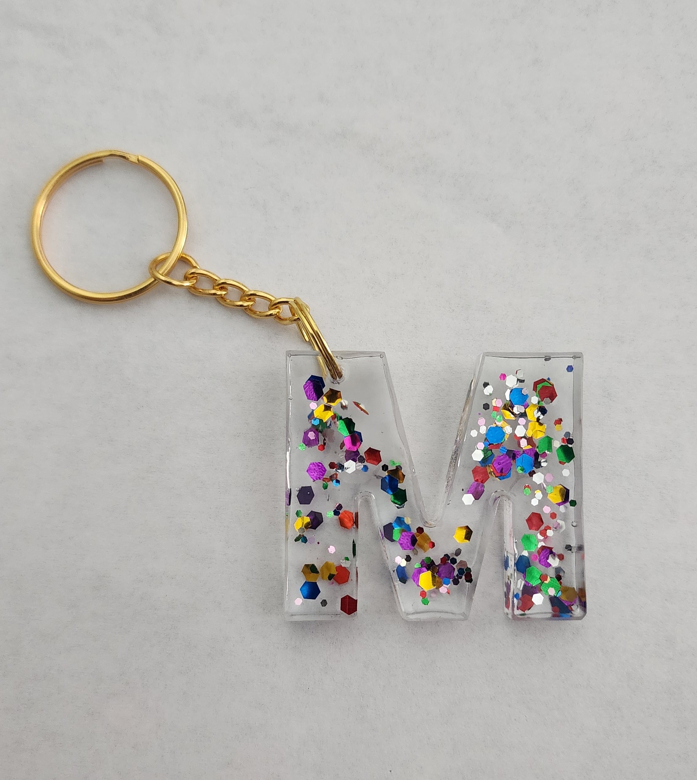 M Keychain- Clear with Rainbow Glitter