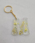 M 'Groovy' Keychain- Clear with Yellow Glitter
