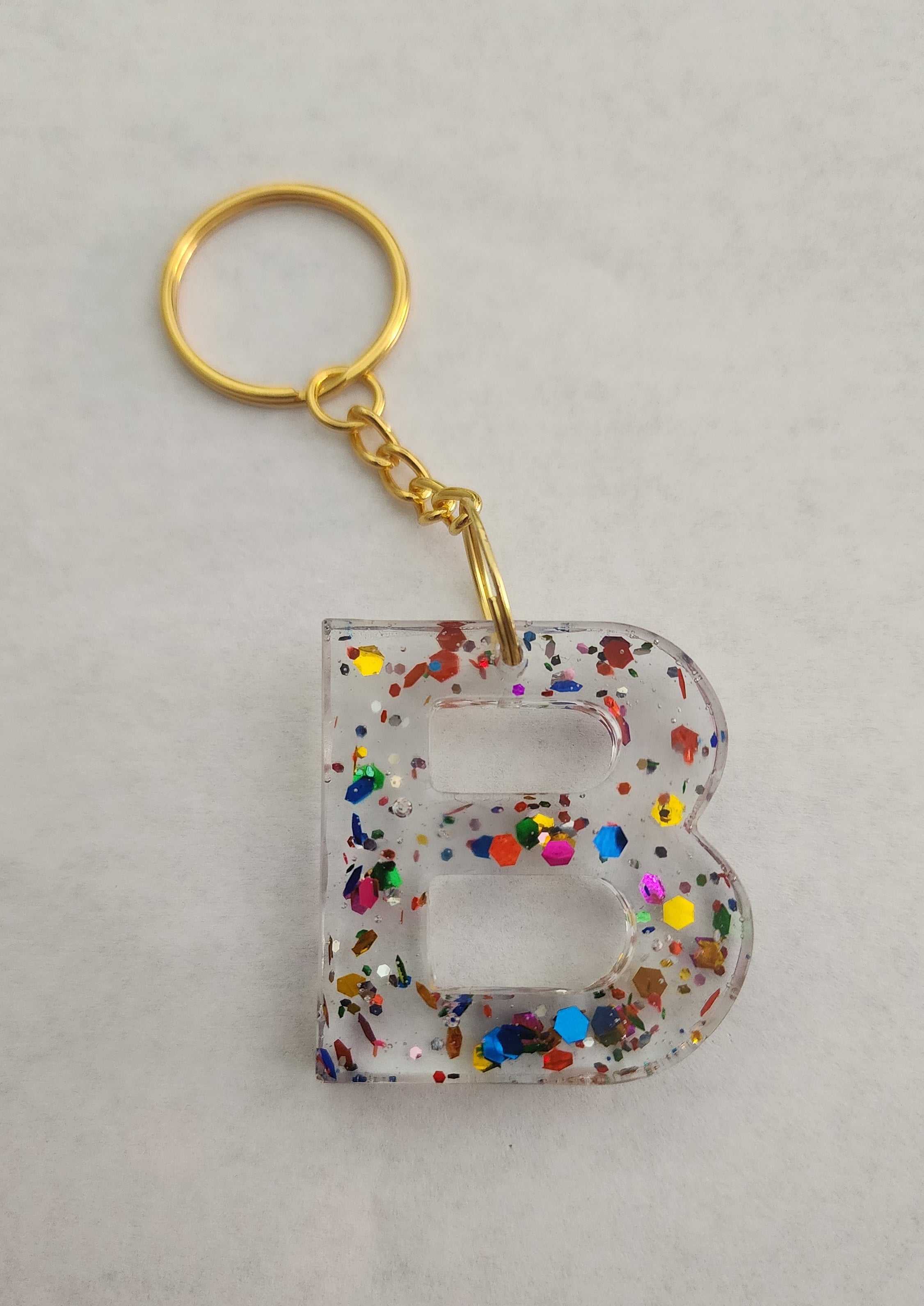 B Keychain- Clear with Rainbow Glitter