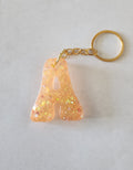 A 'Groovy' Keychain- Orange with glitter