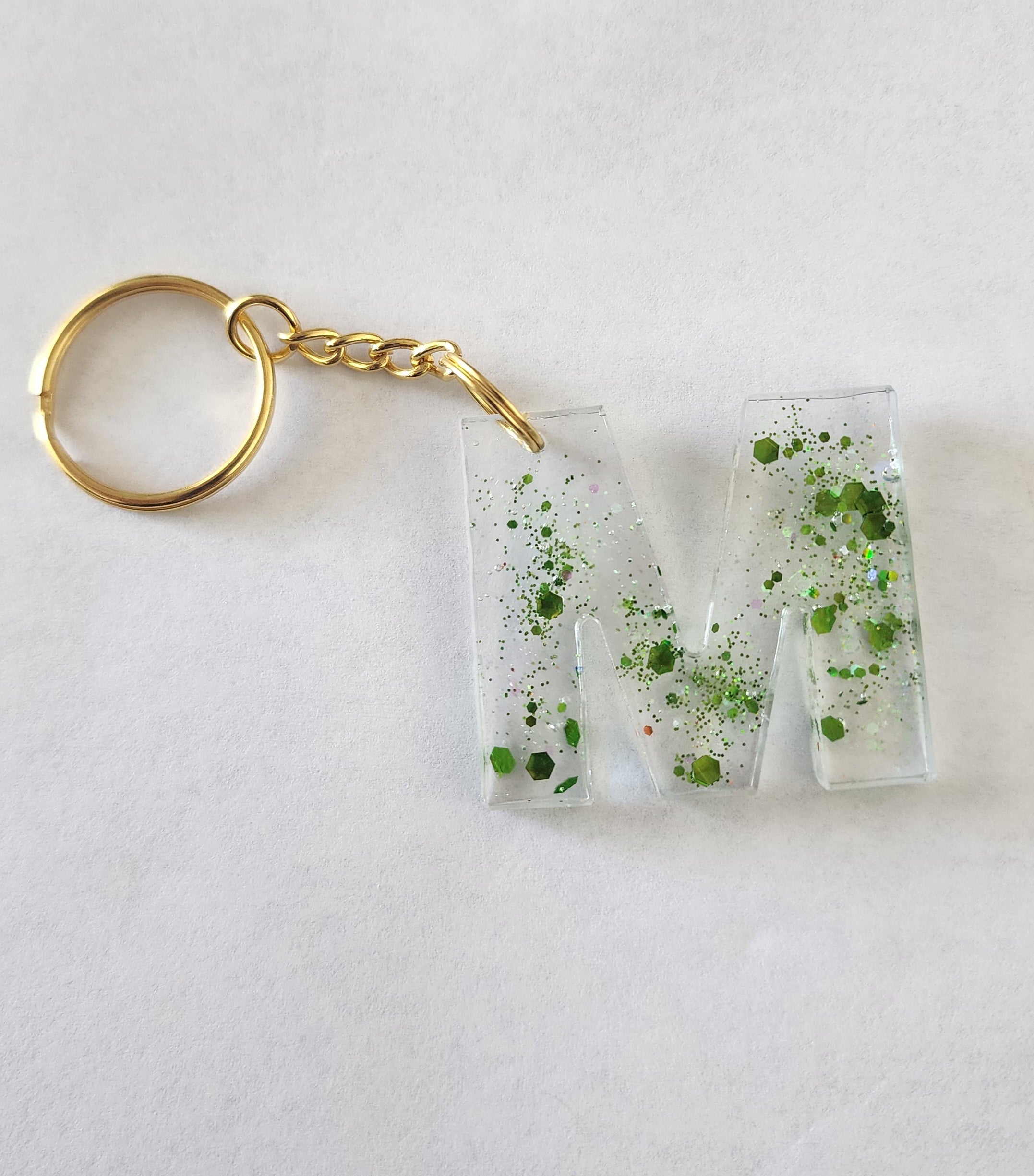 M Keychain-  Clear with Green Glitter
