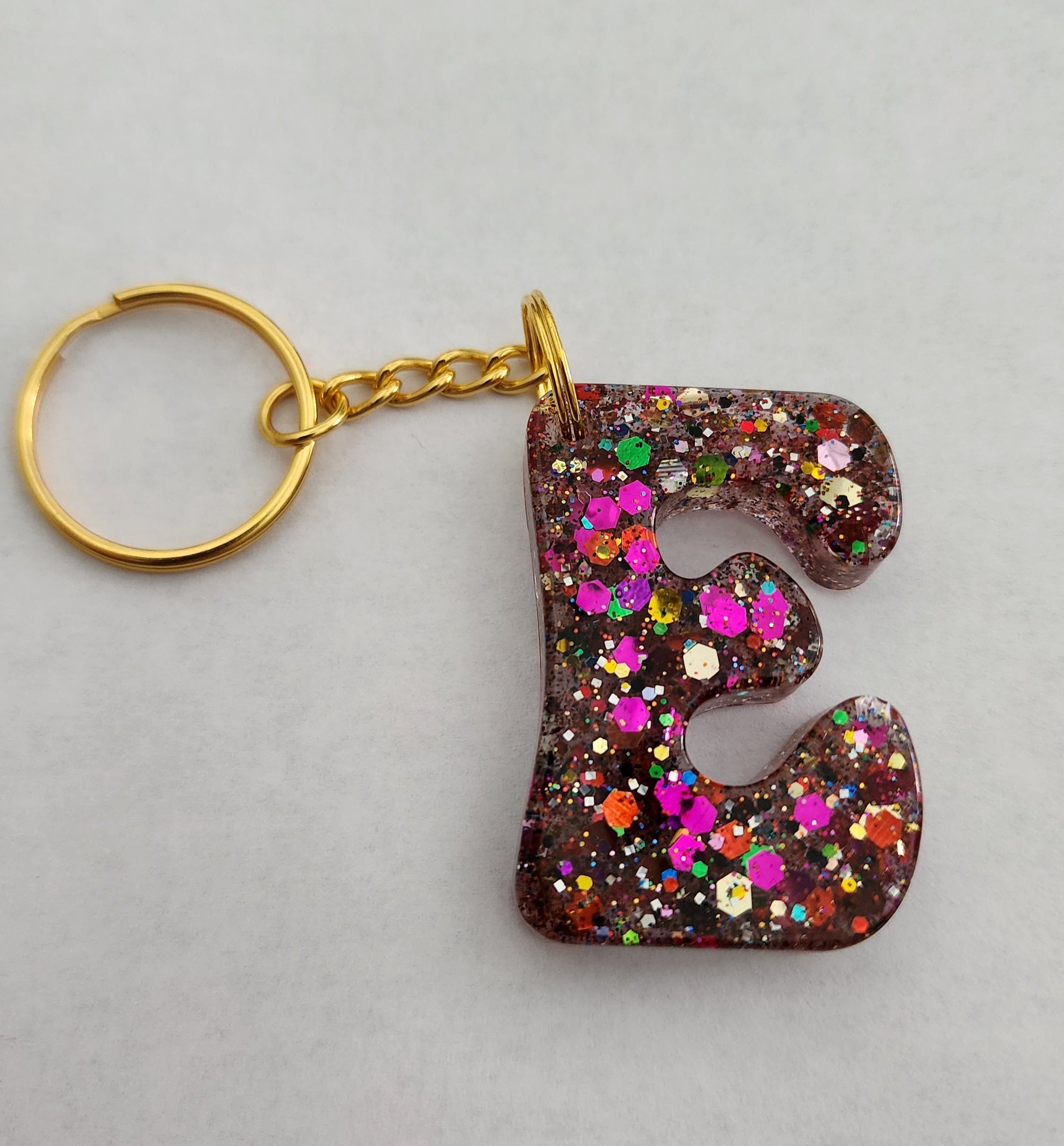 E 'Groovy' Keychain with Rainbow Glitter