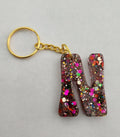 N 'Groovy' Keychain- Rainbow Glitter