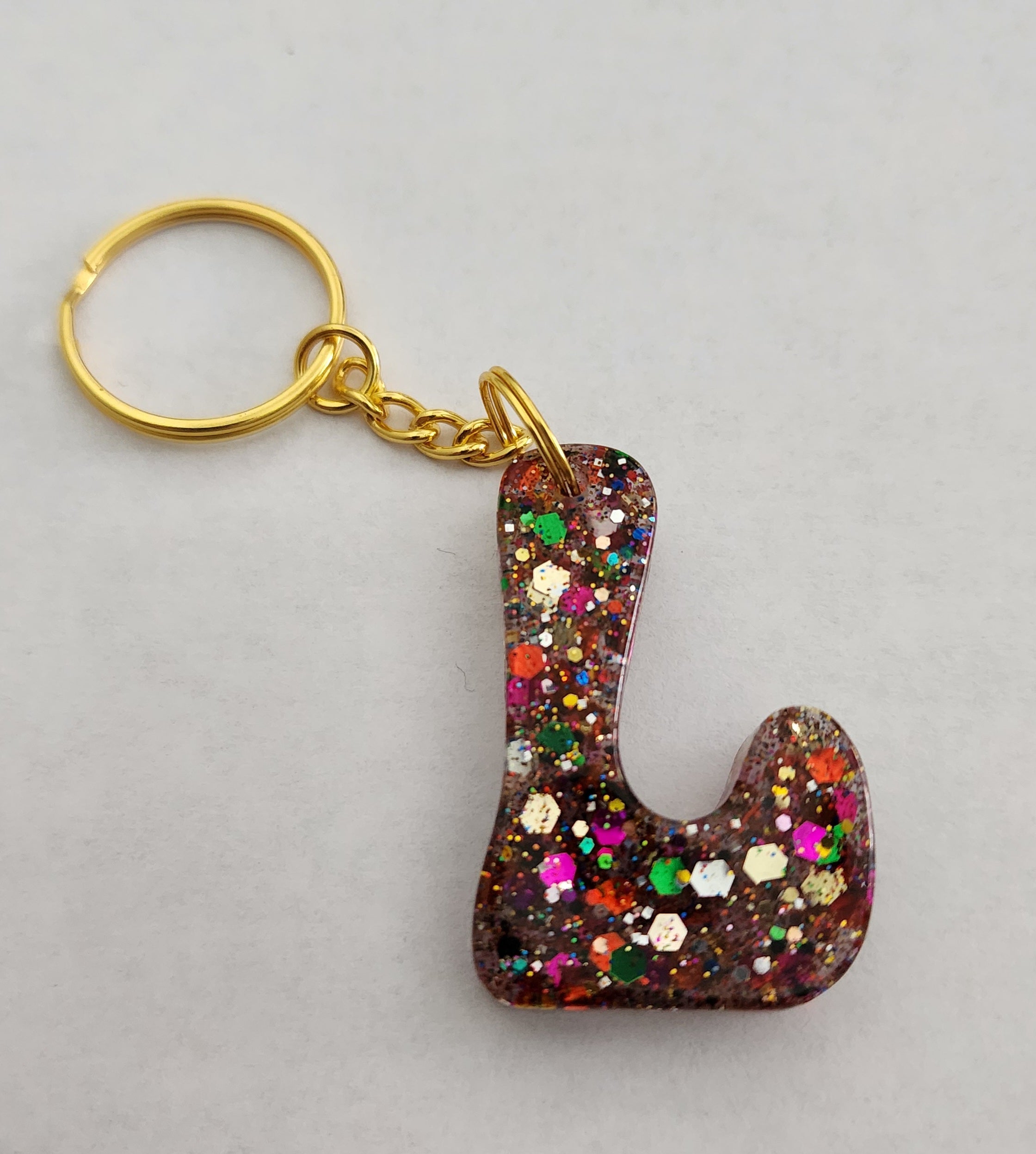 L 'Groovy' Keychain with Rainbow Glitter