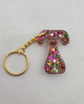 T 'Groovy' Keychain with Rainbow Glitter