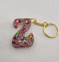 Z 'Groovy' Keychain Clear with Rainbow Glitter