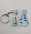 M 'Groovy' Keychain Clear with Blue Glitter
