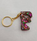 F 'Groovy' Keychain with Rainbow Glitter