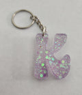 K 'Groovy' Keychain- Clear with Iridescent Glitter