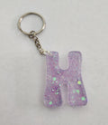 H 'Groovy' Keychain Pink & Iridescent Glitter