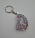 D 'Groovy' Keychain- Clear with Rainbow Glitter