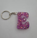 E 'Groovy' Keychain Pink with Glitter