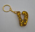 V 'Groovy' Keychain Gold Glitter