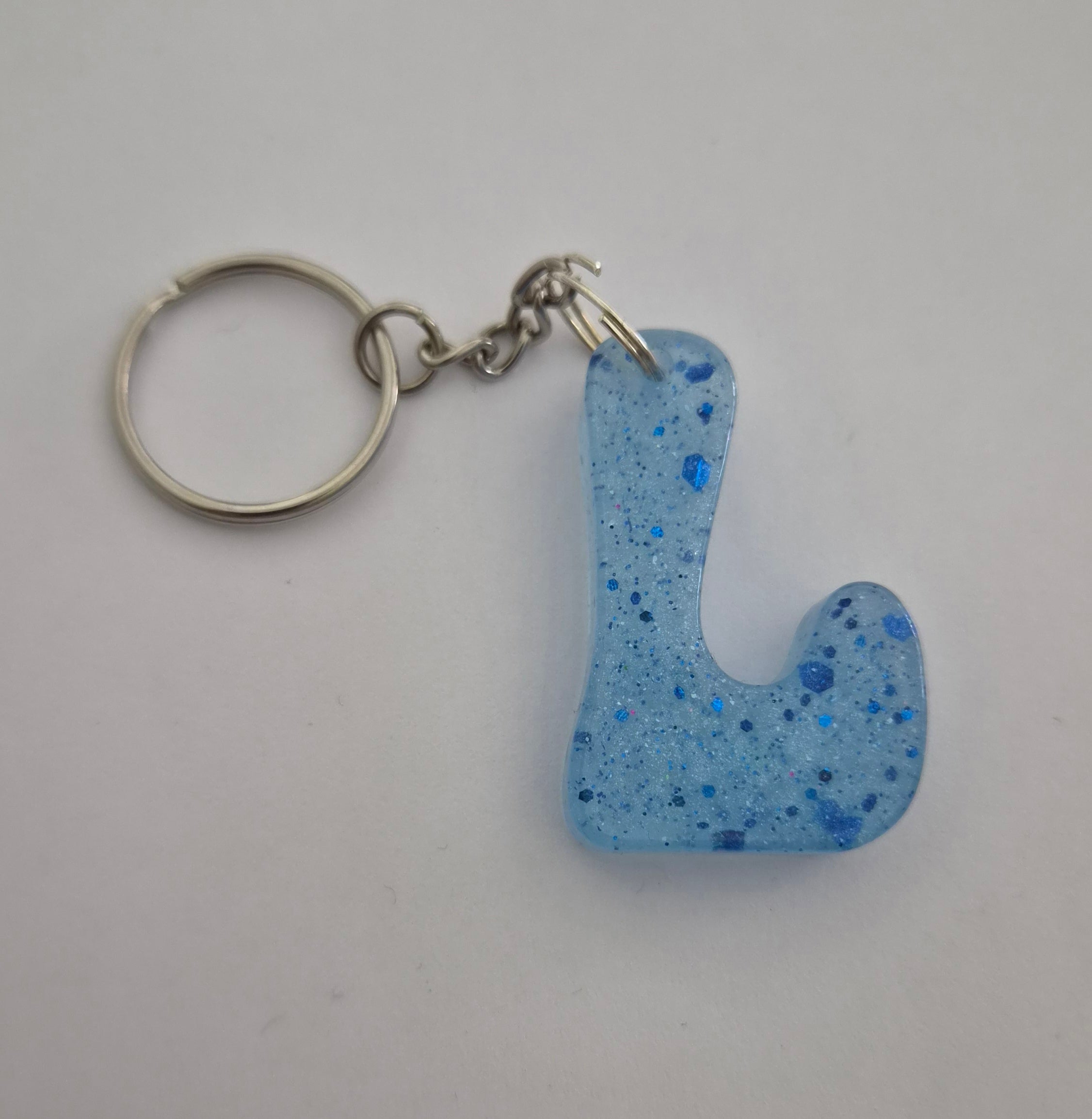 L 'Groovy' Keychain Blue with Blue Glitter