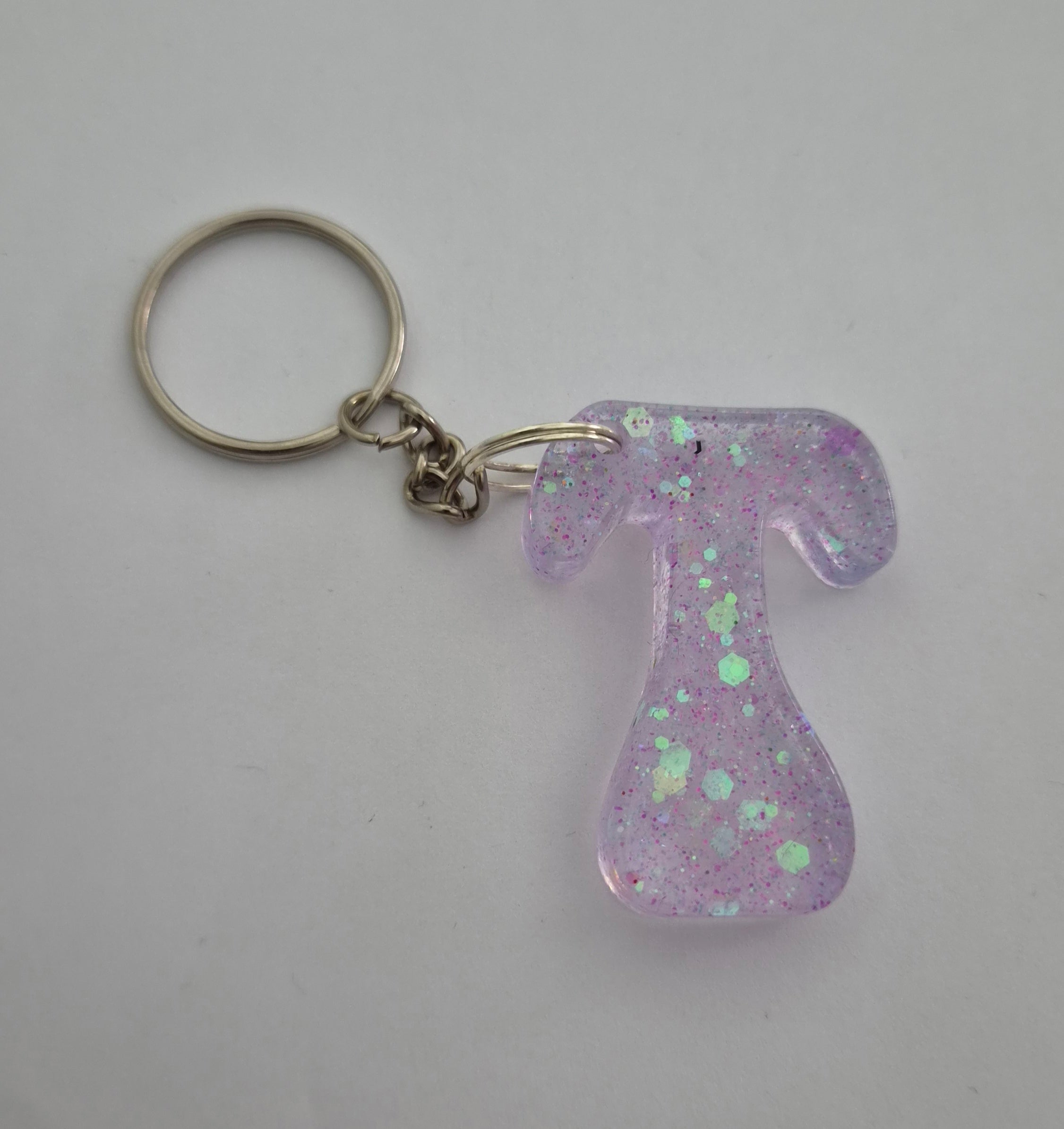 T 'Groovy' Keychain Clear with Iridescent Glitter
