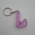 L 'Groovy' Keychain Pink with Purple Glitter