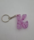 K 'Groovy' Keychain- Pink with Purple Glitter