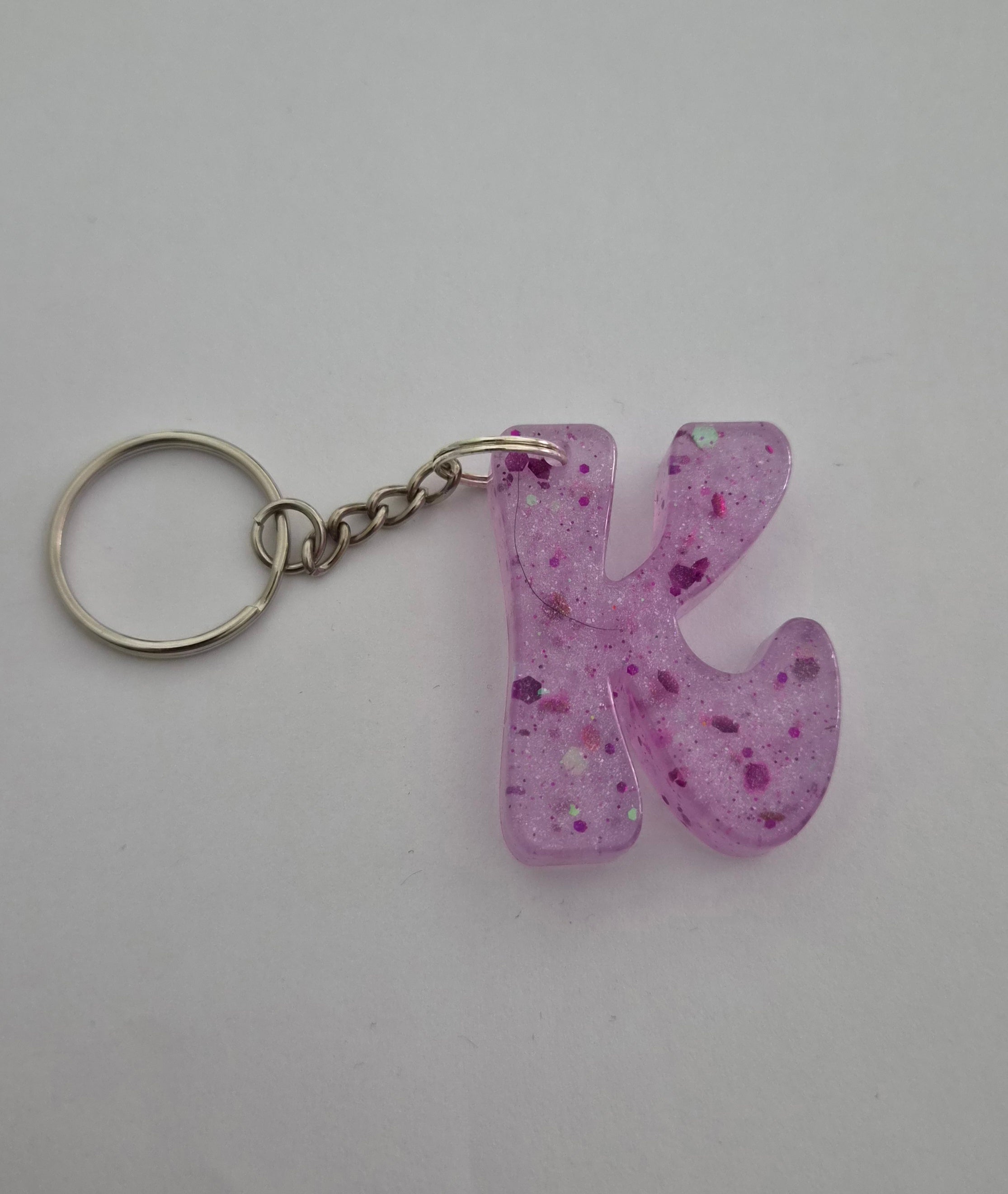 K 'Groovy' Keychain- Pink with Purple Glitter